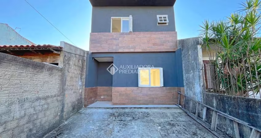 Casa com 3 quartos à venda na Rua Antônio Ribeiro Messias, 155, Hípica, Porto Alegre
