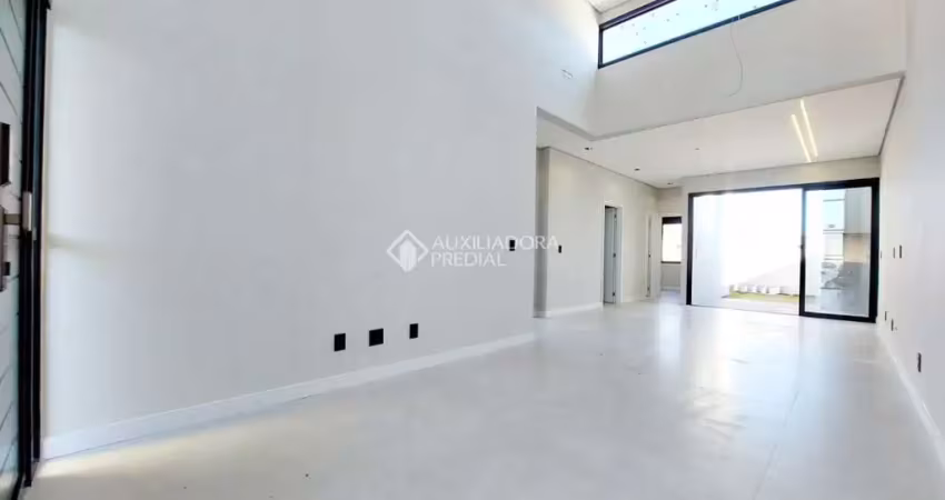 Casa em condomínio fechado com 3 quartos à venda na Avenida Juca Batista, 5505, Hípica, Porto Alegre