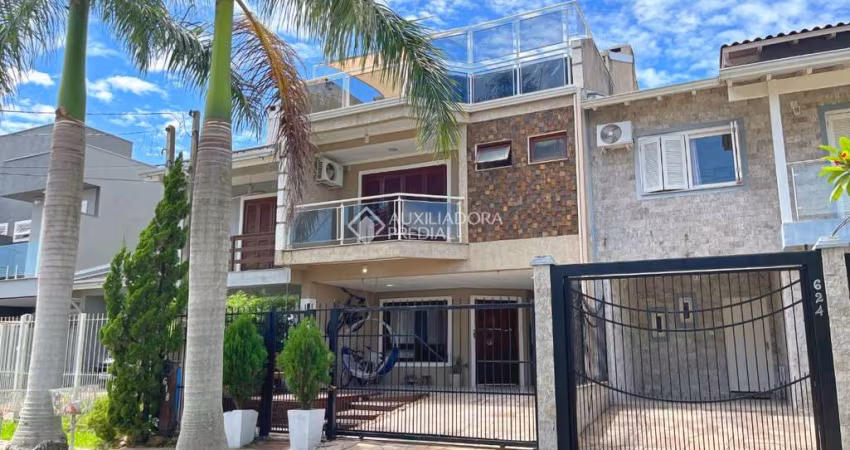 Casa com 3 quartos à venda na Rua Guatambu, 618, Hípica, Porto Alegre