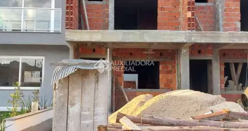 Casa em condomínio fechado com 3 quartos à venda na Rua Embira, 97, Hípica, Porto Alegre