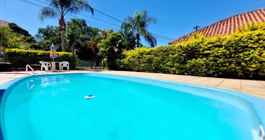 Casa em condomínio fechado com 2 quartos à venda na Avenida Edgar Pires de Castro, 350, Hípica, Porto Alegre