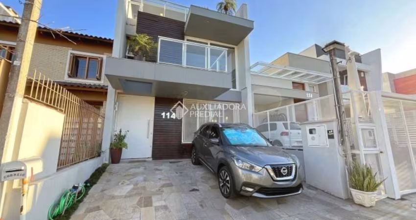 Casa com 3 quartos à venda na Rua Aldo Sani, 114, Hípica, Porto Alegre