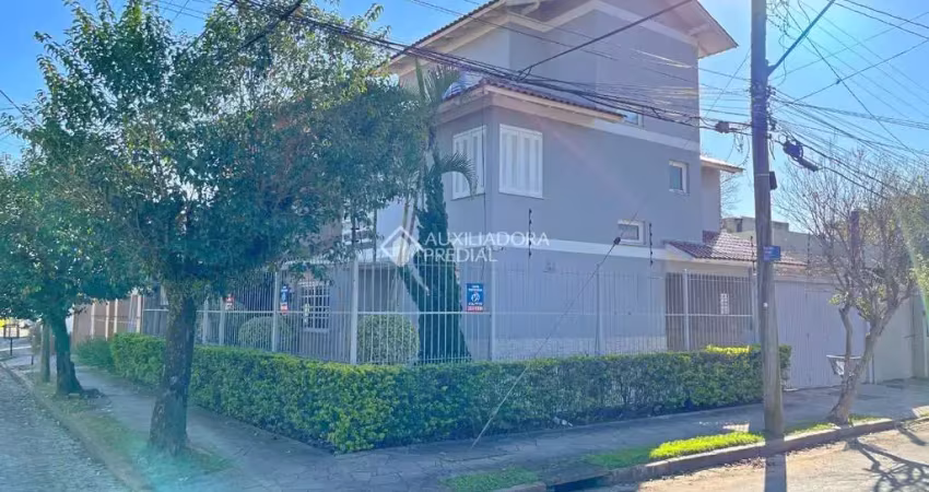 Casa com 3 quartos à venda na Rua Luiz Delfino, 99, Espírito Santo, Porto Alegre