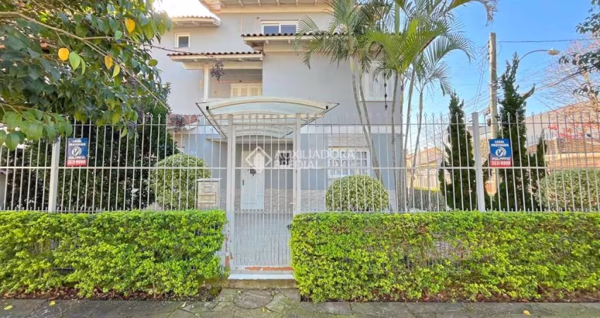 Casa com 3 quartos à venda na Rua Luiz Delfino, 99, Espírito Santo, Porto Alegre