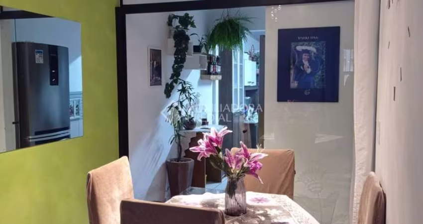 Casa em condomínio fechado com 2 quartos à venda na Rua Capitão Pedroso, 769, Restinga, Porto Alegre