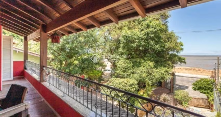 Casa com 4 quartos à venda na Avenida Guaíba, 10660, Ipanema, Porto Alegre