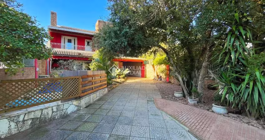 Casa com 4 quartos à venda na Avenida Guaíba, 10660, Ipanema, Porto Alegre