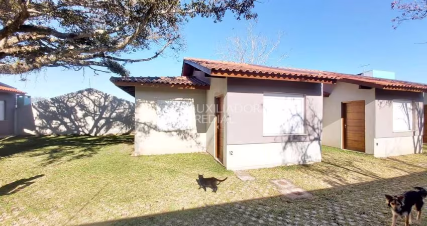 Casa em condomínio fechado com 2 quartos à venda na Rua Santa Mônica, 404, Ponta Grossa, Porto Alegre