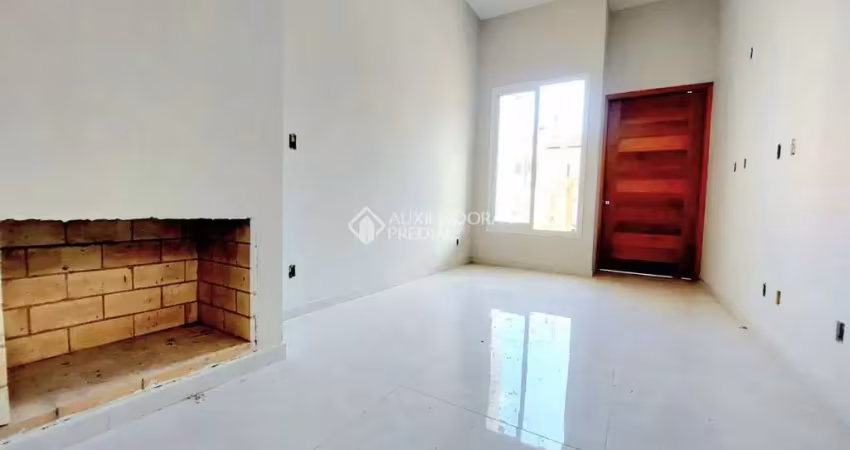 Casa com 3 quartos à venda na Rua Eva Pinto, 113, Hípica, Porto Alegre
