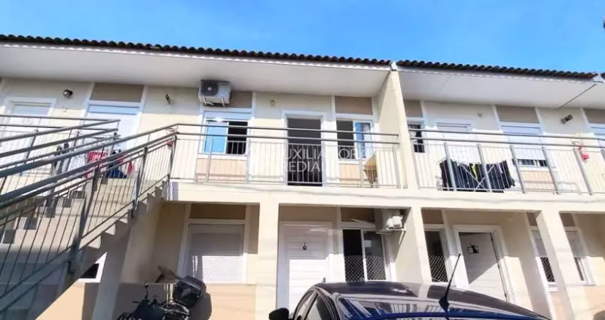 Casa em condomínio fechado com 2 quartos à venda na Nair Garcia Martins, 295, Restinga, Porto Alegre