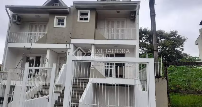 Casa em condomínio fechado com 3 quartos à venda na Rua Claudio da Silva Pinto, 612, Espírito Santo, Porto Alegre