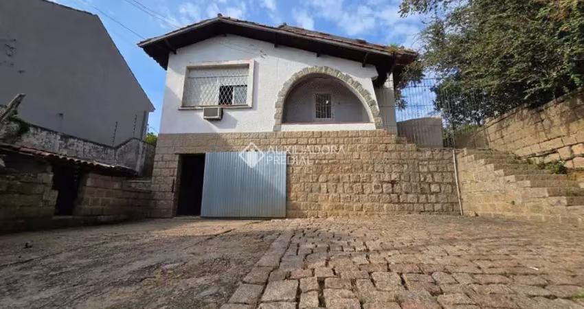 Casa com 3 quartos à venda na Rua Padre João Batista Reus, 2595, Camaquã, Porto Alegre