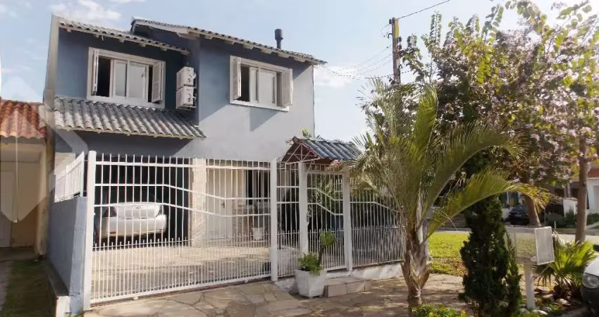 Casa com 3 quartos à venda na Rua Manacá, 116, Hípica, Porto Alegre