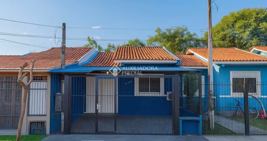 Casa com 3 quartos à venda na Rua Pedro Faria, 540, Hípica, Porto Alegre