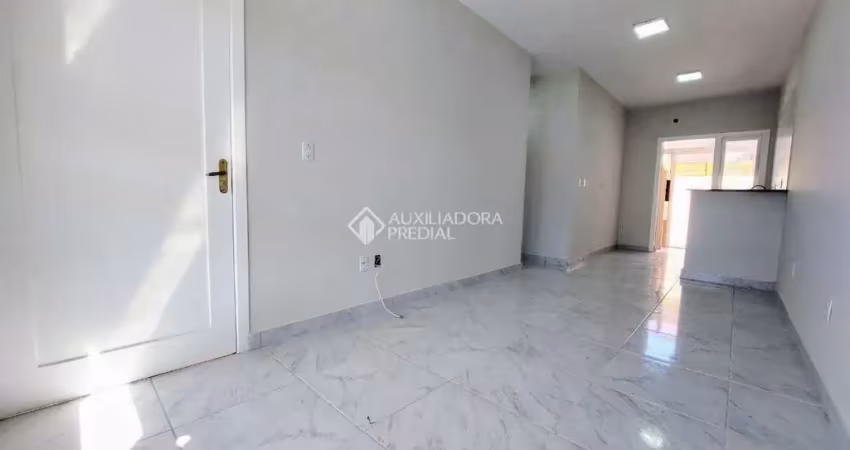 Casa em condomínio fechado com 2 quartos à venda na Rua Embira, 170, Hípica, Porto Alegre