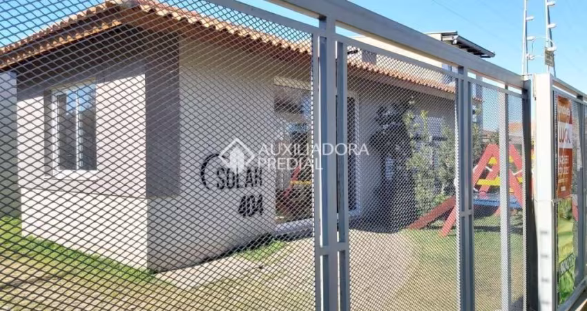 Casa em condomínio fechado com 2 quartos à venda na Rua Santa Mônica, 404, Ponta Grossa, Porto Alegre