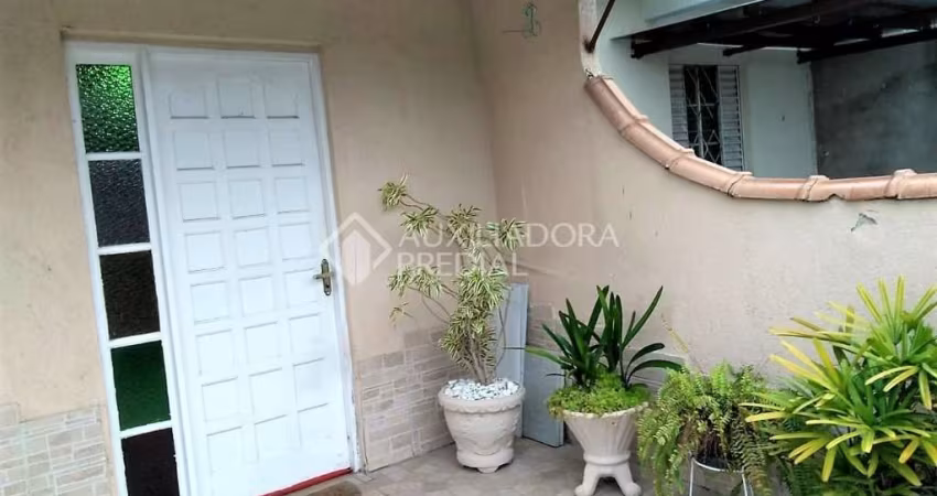 Casa em condomínio fechado com 3 quartos à venda na Rua Elvira Dendena, 385, Hípica, Porto Alegre