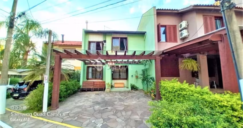 Casa em condomínio fechado com 3 quartos à venda na Avenida Juca Batista, 4095, Hípica, Porto Alegre