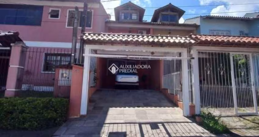 Casa com 3 quartos à venda na Rua James Bocacio, 116, Hípica, Porto Alegre