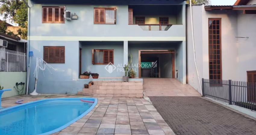 Casa com 4 quartos à venda na Rua Canela, 110, Ouro Branco, Novo Hamburgo