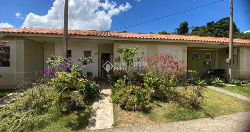 Casa em condomínio fechado com 2 quartos à venda na Jozino Liotti, 300, Jardim Algarve, Alvorada
