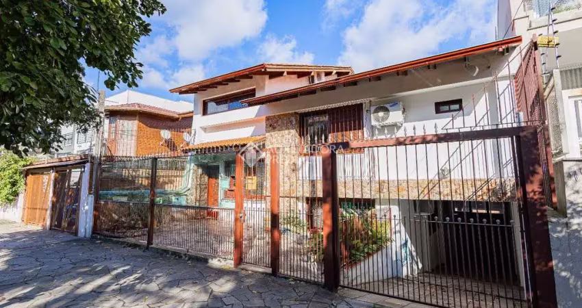 Casa com 4 quartos à venda na Rua Professor Ulisses Cabral, 64, Chácara das Pedras, Porto Alegre
