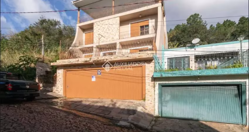 Casa com 4 quartos à venda na Rua Professor Luiz Antônio Lopes, 530, Morro Santana, Porto Alegre