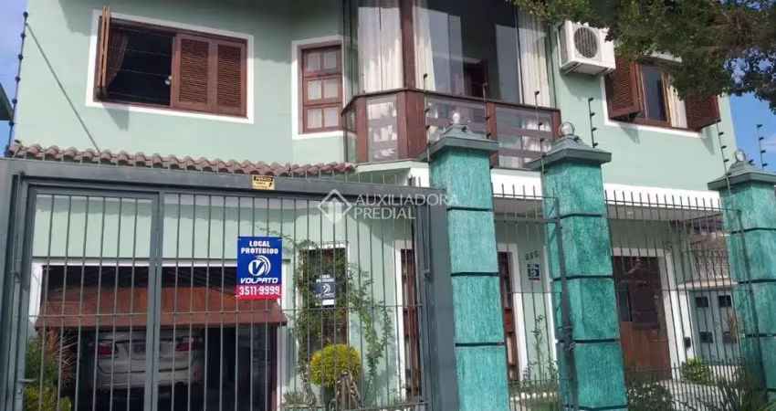 Casa com 5 quartos à venda na Rua Doutor Telmo Vergara, 554, Partenon, Porto Alegre