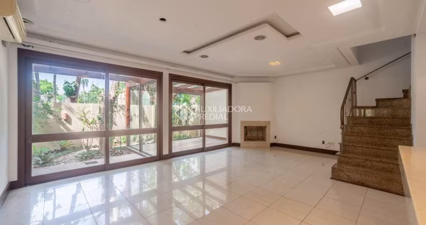 Casa em condomínio fechado com 3 quartos à venda na Avenida Otto Niemeyer, 77, Camaquã, Porto Alegre