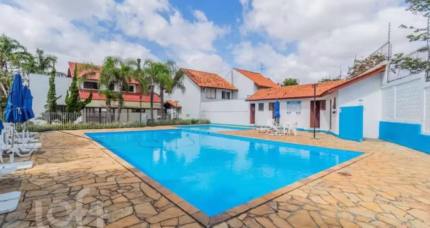 Casa em condomínio fechado com 3 quartos à venda na Avenida Eduardo Prado, 695, Cavalhada, Porto Alegre