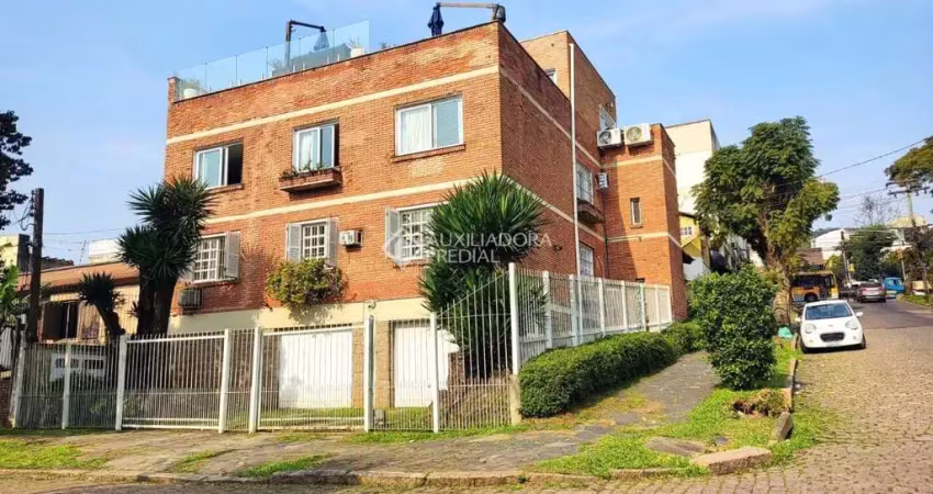 Apartamento com 3 quartos à venda na Rua Márcio Dias, 45, Nonoai, Porto Alegre