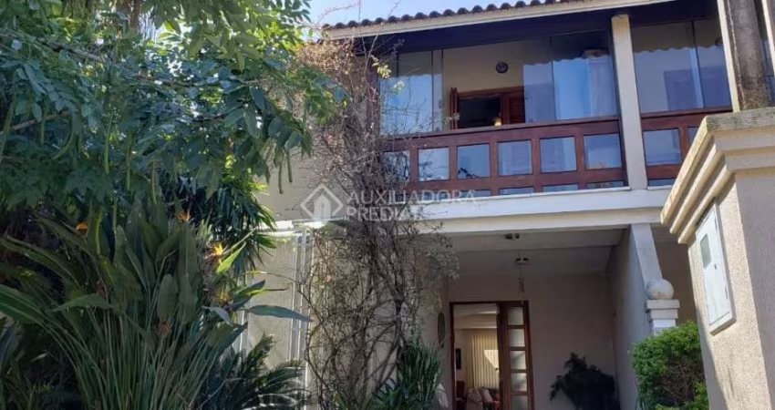 Casa em condomínio fechado com 3 quartos à venda na Avenida Eduardo Prado, 2050, Cavalhada, Porto Alegre