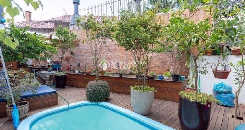 Casa em condomínio fechado com 4 quartos à venda na Rua Morano Calabro, 51, Jardim Isabel, Porto Alegre