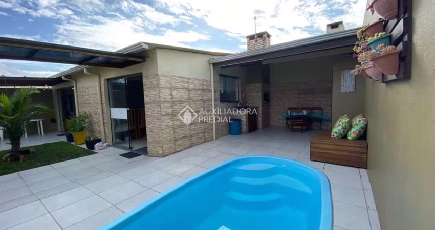Casa com 4 quartos à venda na Josue Guimarães, 208, Mariluz (Distrito), Imbé