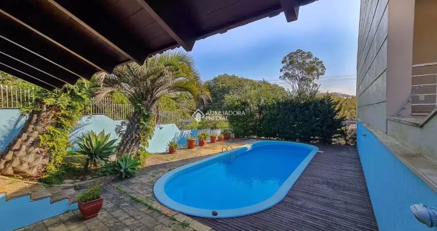 Casa em condomínio fechado com 4 quartos à venda na Rua Dona Adda Mascarenhas de Moraes, 1167, Jardim Itu Sabará, Porto Alegre