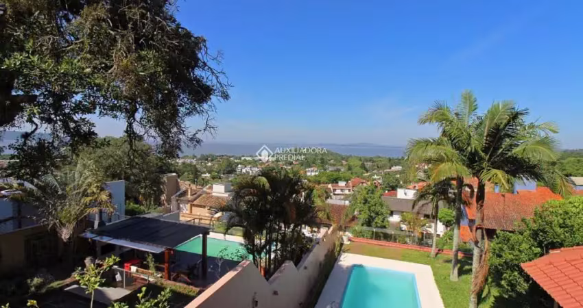 Casa com 4 quartos à venda na Rua Doutor Arnaldo da Silva Ferreira, 320, Jardim Isabel, Porto Alegre