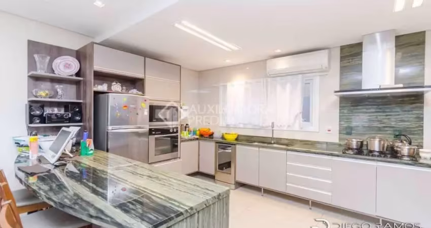 Casa em condomínio fechado com 4 quartos à venda na Rua Doutor Campos Velho, 1245, Cristal, Porto Alegre