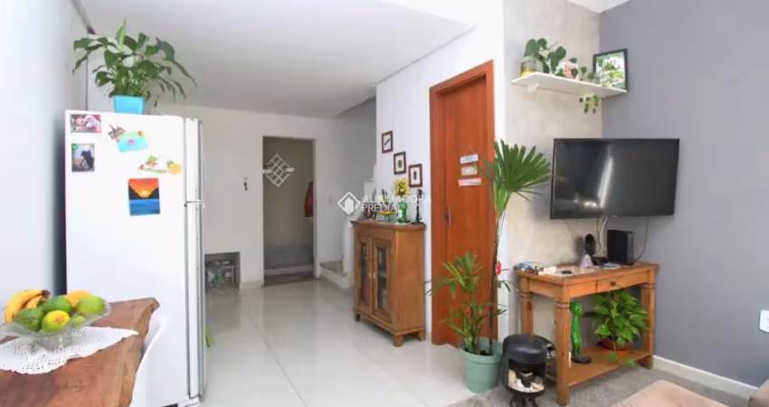Casa em condomínio fechado com 2 quartos à venda na Rua Sebastião Wolf, 281, Nonoai, Porto Alegre