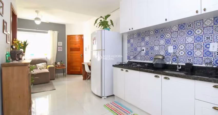 Casa em condomínio fechado com 2 quartos à venda na Rua Sebastião Wolf, 281, Nonoai, Porto Alegre