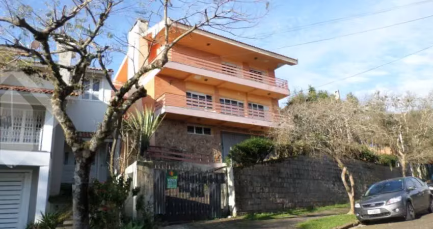 Casa com 4 quartos à venda na Rua Caeté, 1047, Vila Assunção, Porto Alegre