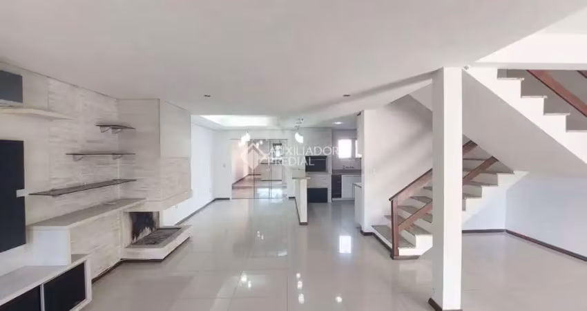 Casa em condomínio fechado com 4 quartos à venda na Rua Alexandre de Gusmão, 390, Hípica, Porto Alegre