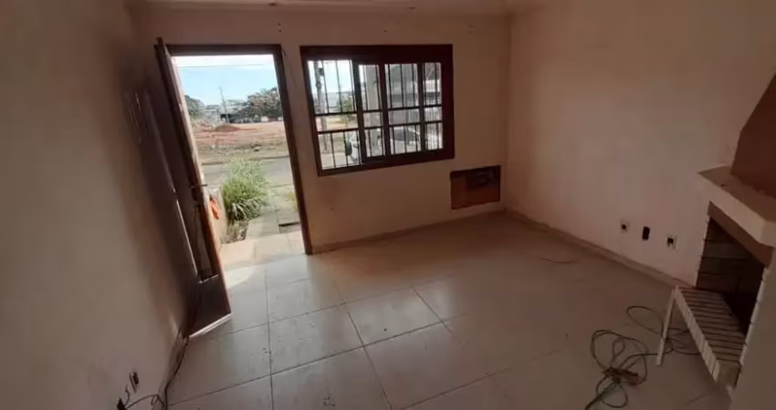 Casa com 3 quartos à venda na Rua Waldemar da Silva Tavares, 210, Guarujá, Porto Alegre