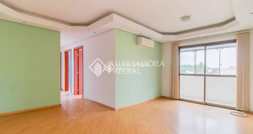 Apartamento com 3 quartos à venda na Rua Frederico Etzberger, 195, Nonoai, Porto Alegre