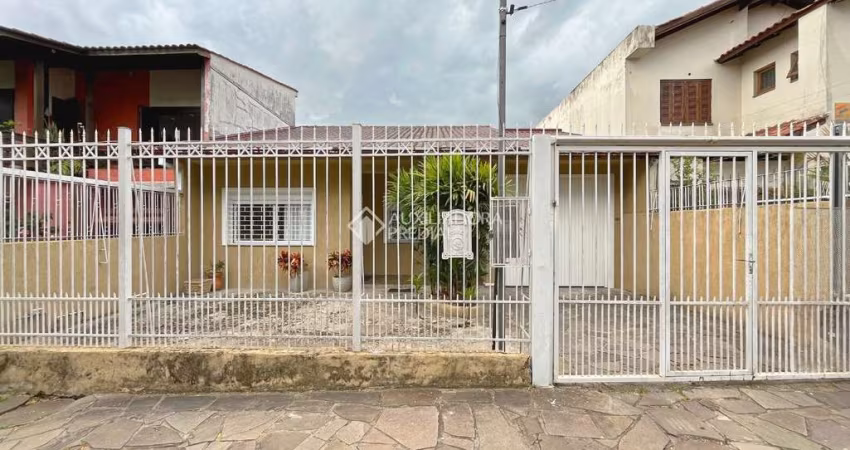 Casa com 3 quartos à venda na Rua Coelho da Costa, 15, Nonoai, Porto Alegre