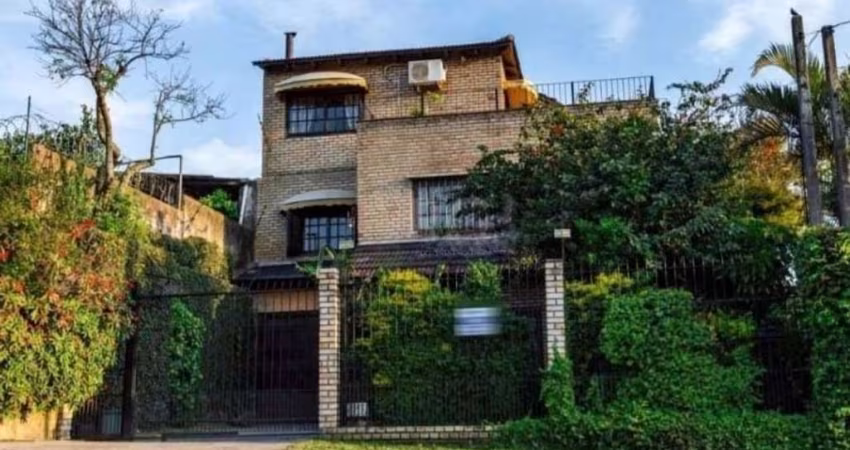 Casa com 3 quartos à venda na Rua Arapei, 325, Cristal, Porto Alegre
