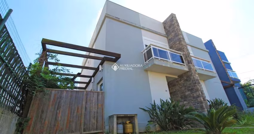 Casa em condomínio fechado com 3 quartos à venda na Rua Sérgio Iglésias Barcellos, 34, Lomba do Pinheiro, Porto Alegre