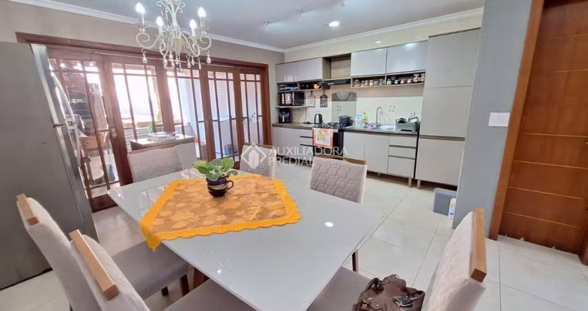 Casa com 4 quartos à venda na Rua Luiz Linck Barcelos, 216, Loteamento Jardim Timbaúva, Gravataí