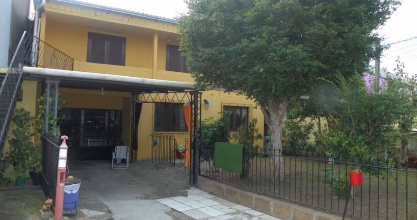 Casa com 3 quartos à venda na Avenida Monte Cristo, 515, Vila Nova, Porto Alegre