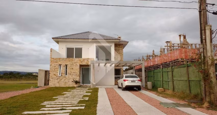 Casa em condomínio fechado com 4 quartos à venda na Avenida Juca Batista, 9000, Belém Novo, Porto Alegre