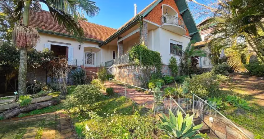 Casa com 4 quartos à venda na Rua Doutor Possidônio Cunha, 16, Vila Assunção, Porto Alegre